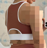 نیمتنه ی ورزشی زنانه مدل اسلیم افکت نوار دوزی شده برند cocogym کد 0246